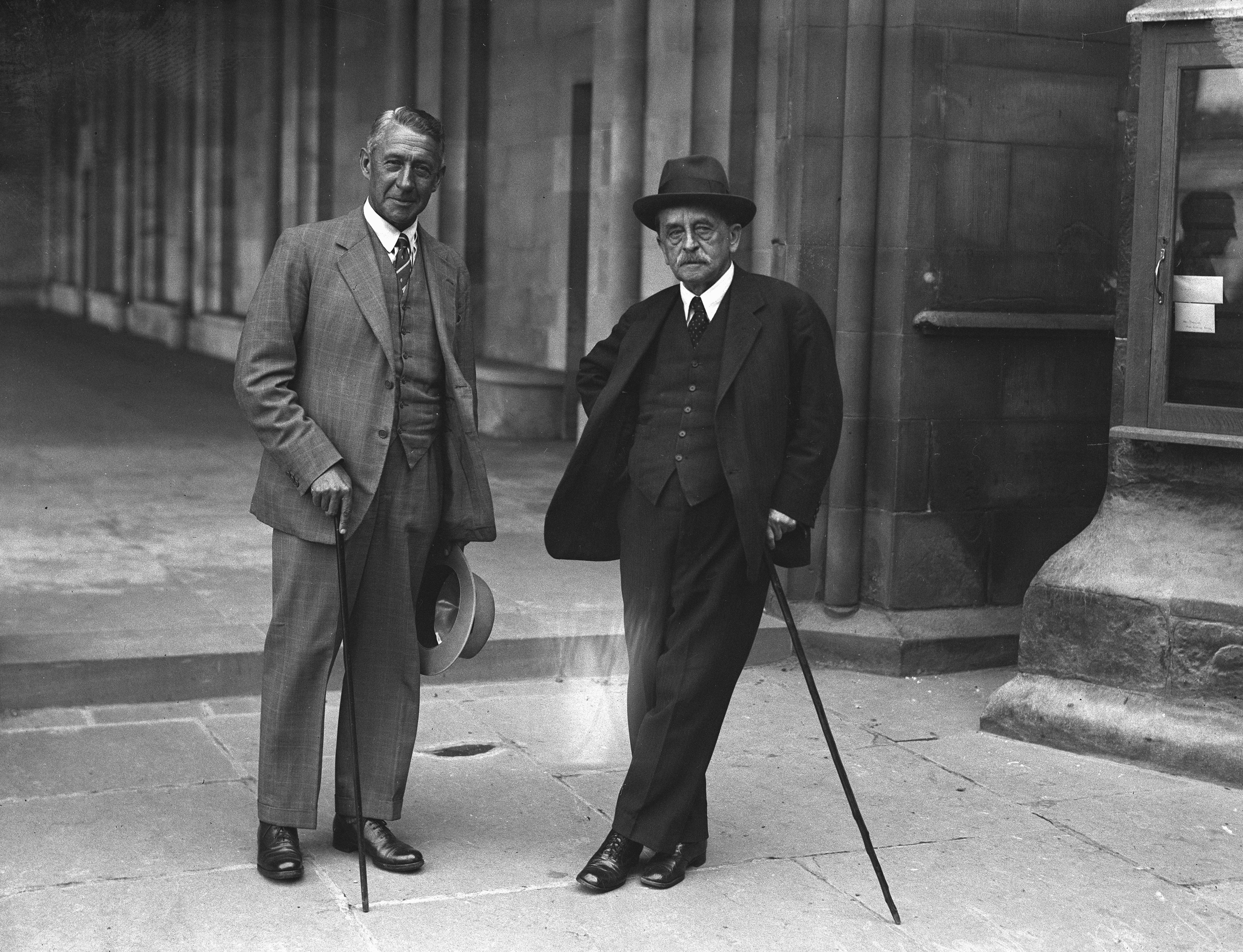 Barrie (right), seen here with St Andrews Principal Sir James Colquhoun Irvine outside St. Salvator’s chapel in 1919. (St Andrews Photographic Collection GMC-19-67)  