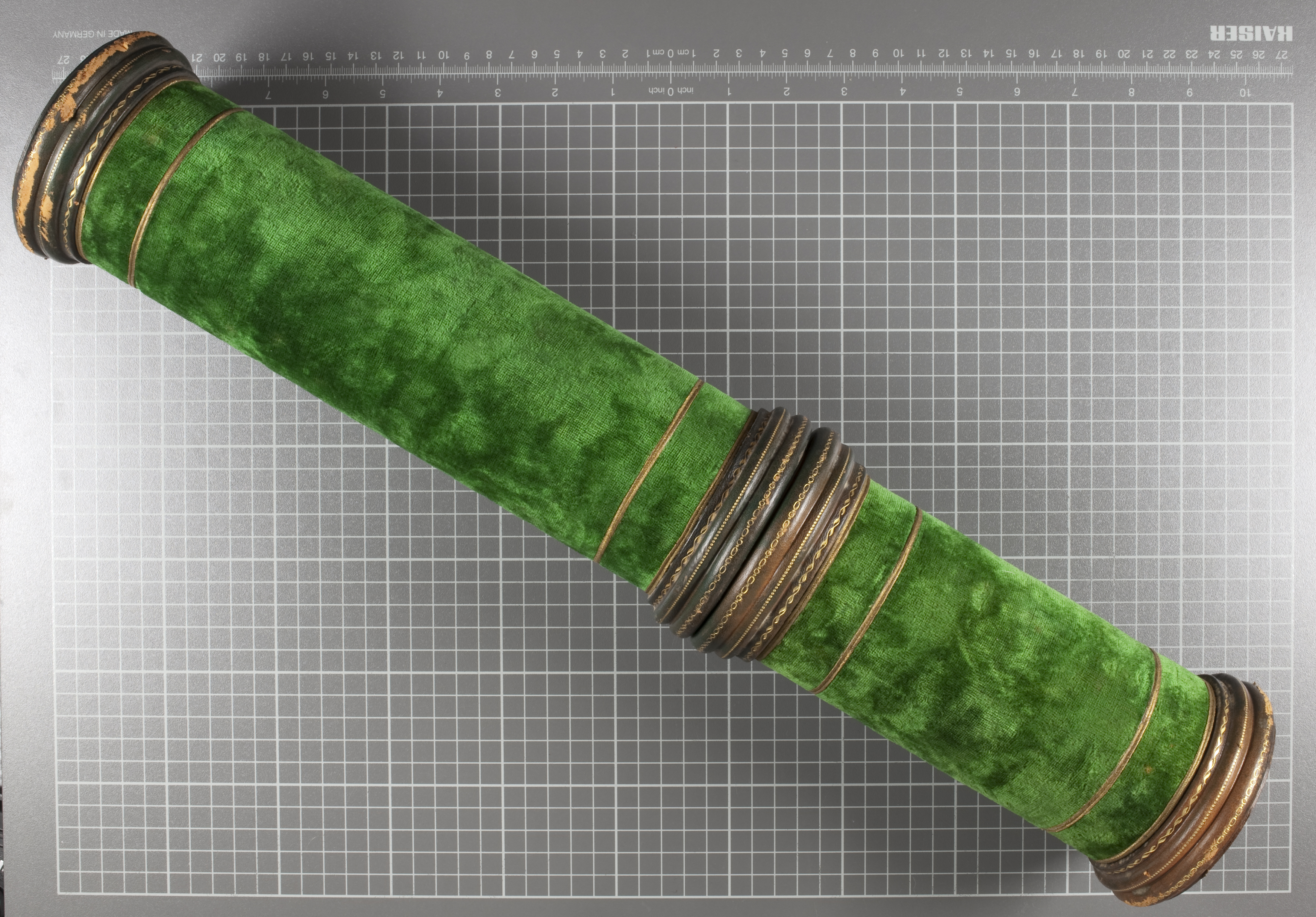 A green velvet scroll case