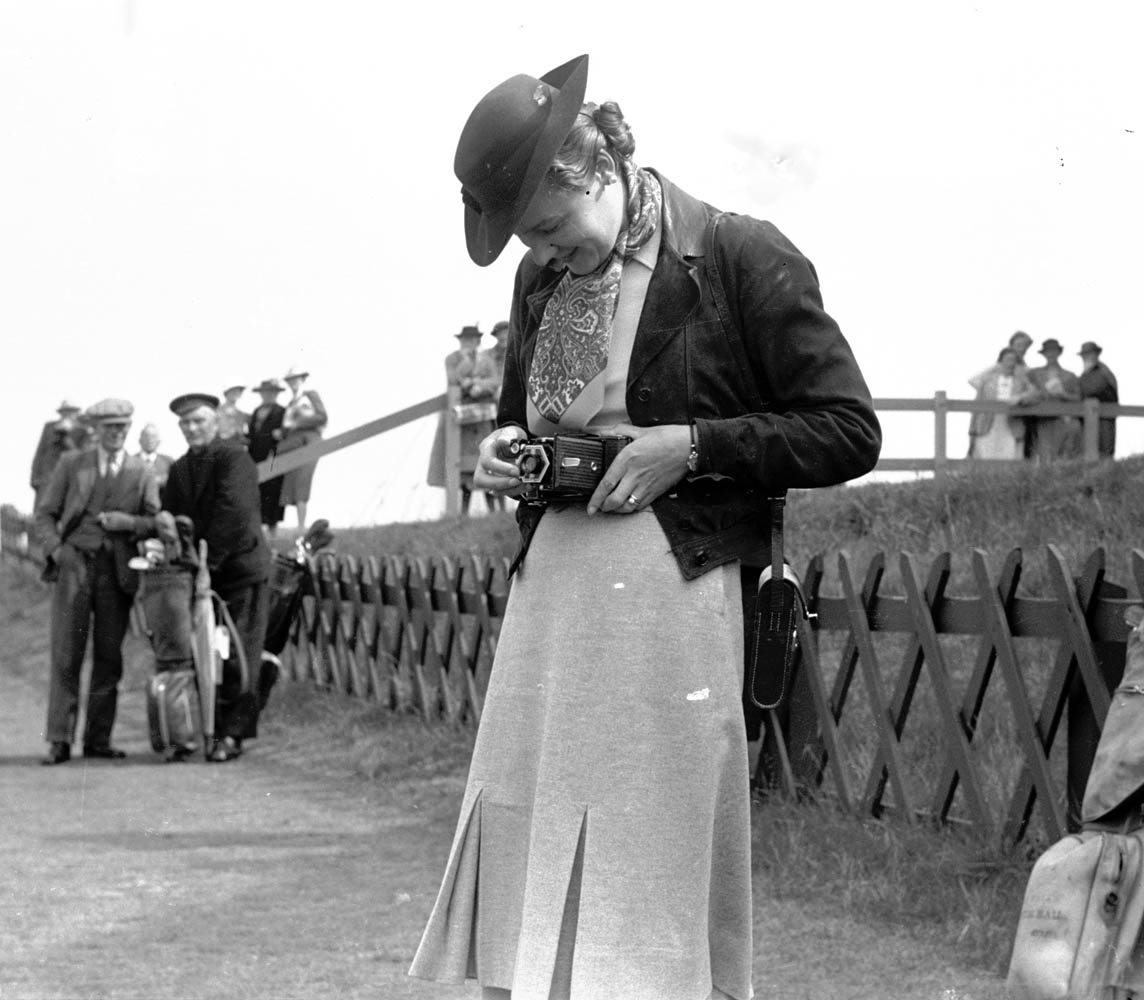 'Woman with camera, Open Championship at St Andrews,' by G.M. Cowie, 1939 (St Andrews GMC-FG-111B-7)