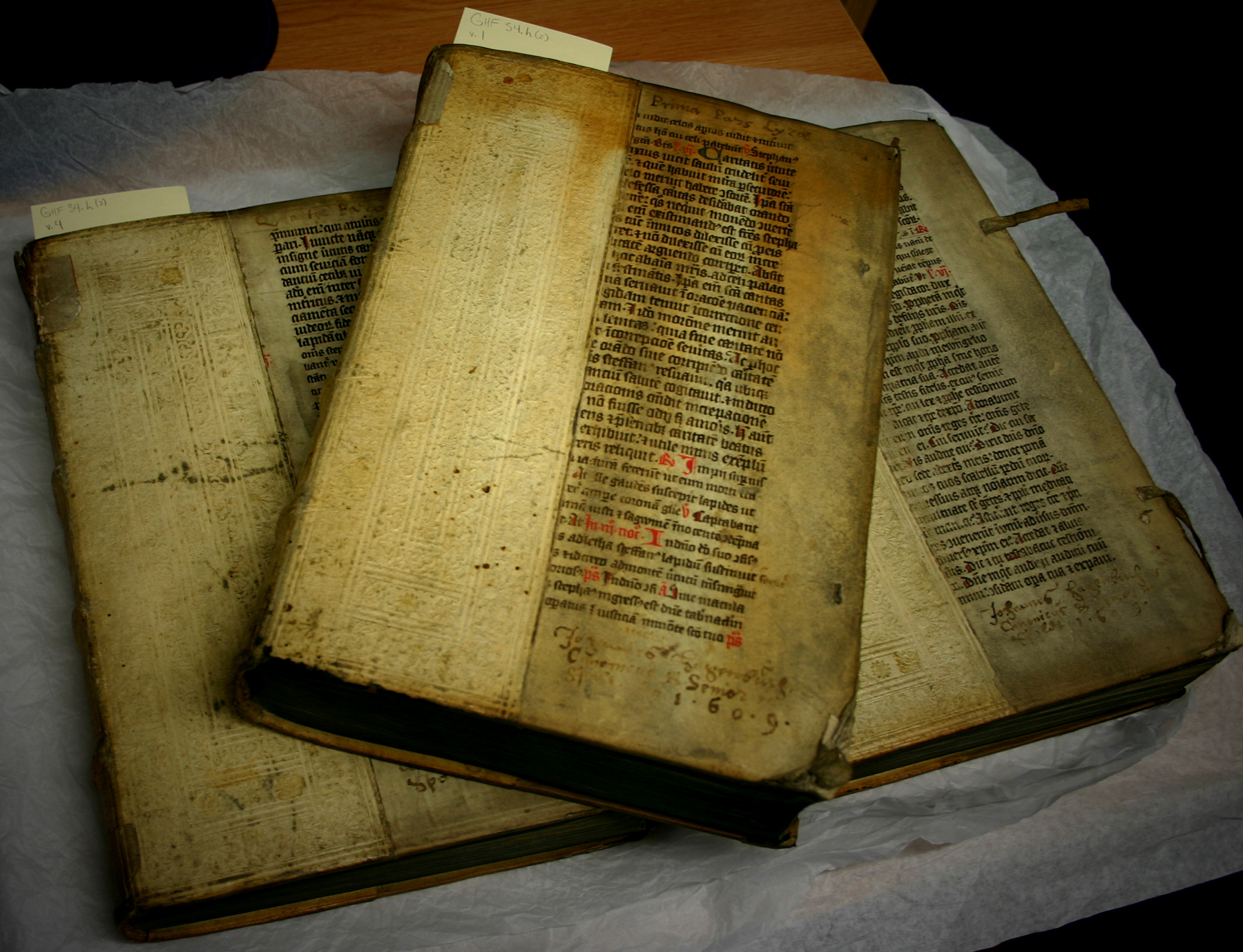 Three volumes from the George Hay Forbes Collection, half bound in 16th century alum tawed pigskin and 14th century manuscript fragments. GHF34.h(2).