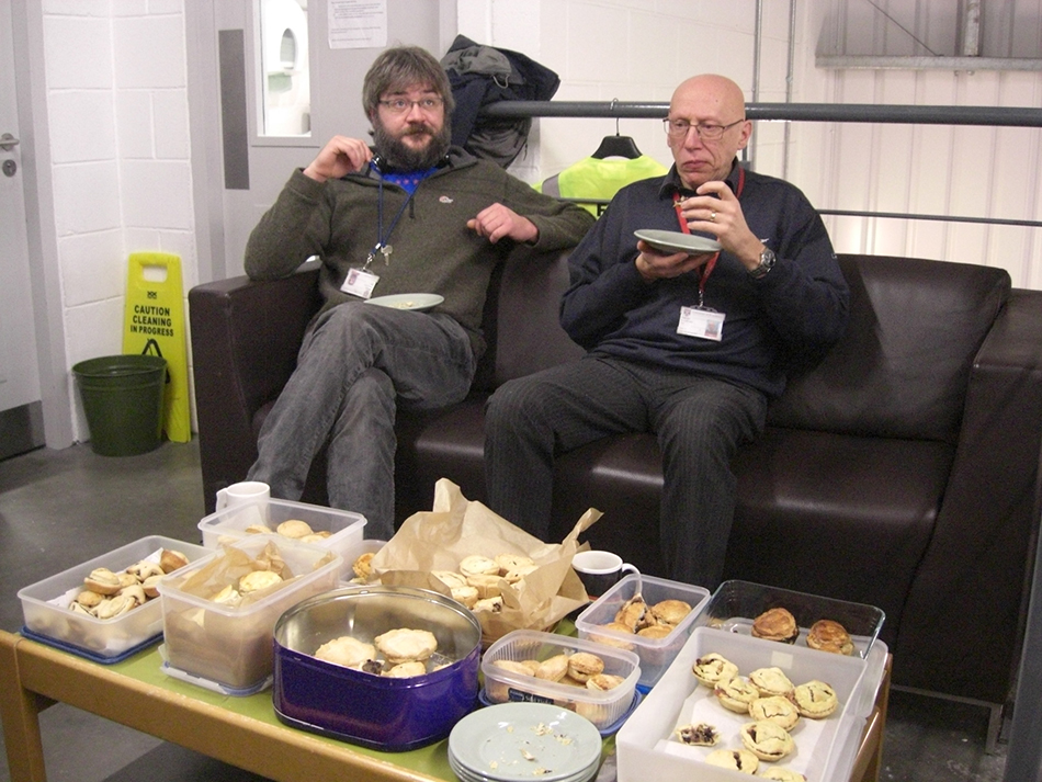 Judging the meaty pies, Eddie is surprised at how good they are, Norman is still not sure