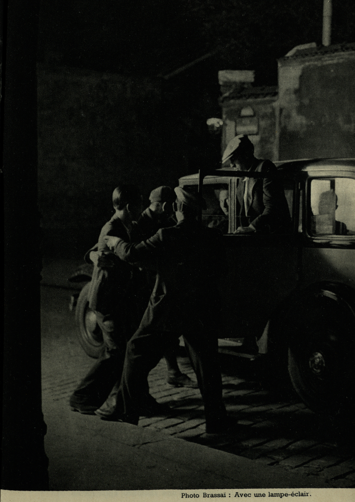 An example of Brassaï’s mastery of flash photography in the dark streets of Paris, from Éclairages artificiels (St Andrews copy Photo TR590.N38) 