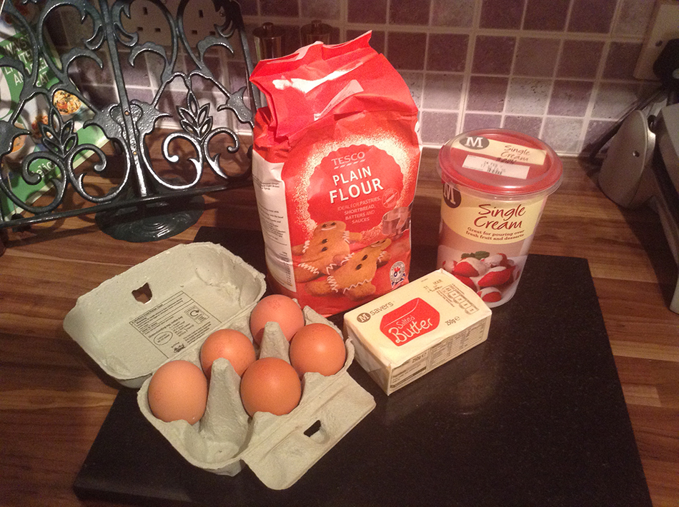 Ingredients for Grandmother Cockayn’s pancakes, eggs, butter, flour, cream.