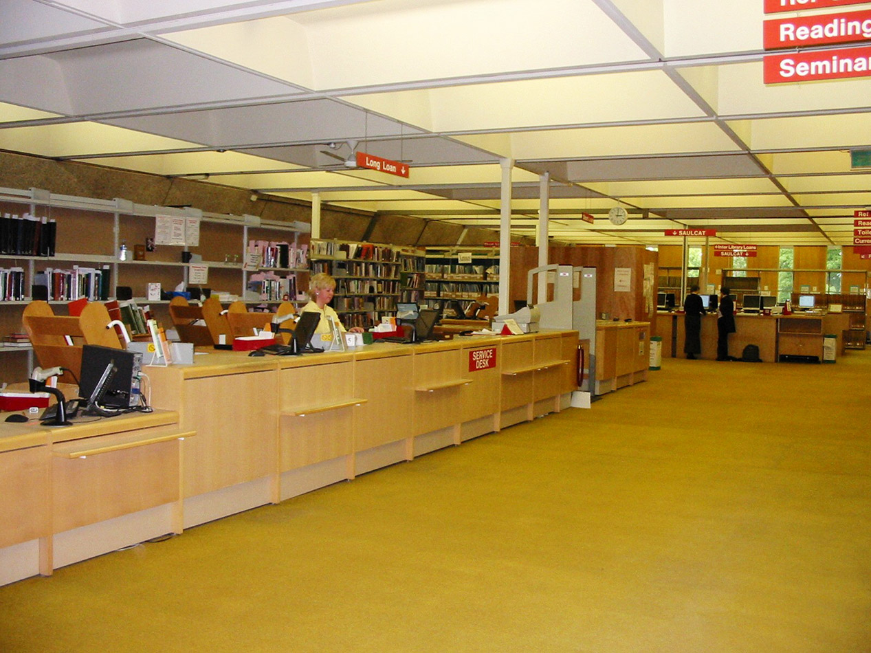 The Service Desk in the Main Library before the recent refurbishment, with the very 1970s mustard-coloured carpet.