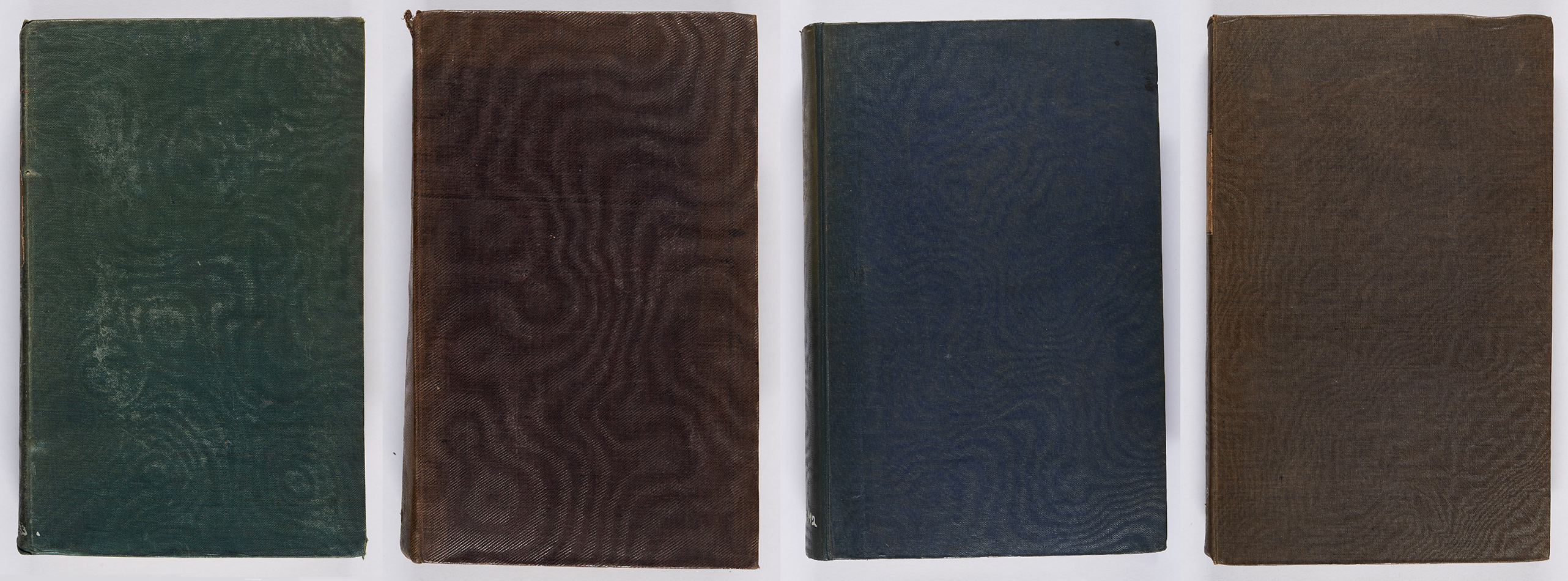 Some examples of bindings with a moiré rib, in a variety of coloured cloths. Henry Ellis, A general introduction to Domesday book, 2 vol. (London: printed by command of His Majesty King William IV under the direction of the Commissioners of the Public records of the Kingdom, 1833) s DA190.E5E33 ; Thomas Wemyss, A key to the symbolical language of Scripture (Edinburgh, T. Clark, 1835), s BS477.W3 ; George Montagu, Horae Hebraicae (London: James Nisbet & Co, 1835), s BS2775.M2 ; Francis Hutton, A series of discourses on Christ's temptation in the wilderness (London: Bowdery and Kerby, 1833),  s BT355.H9.