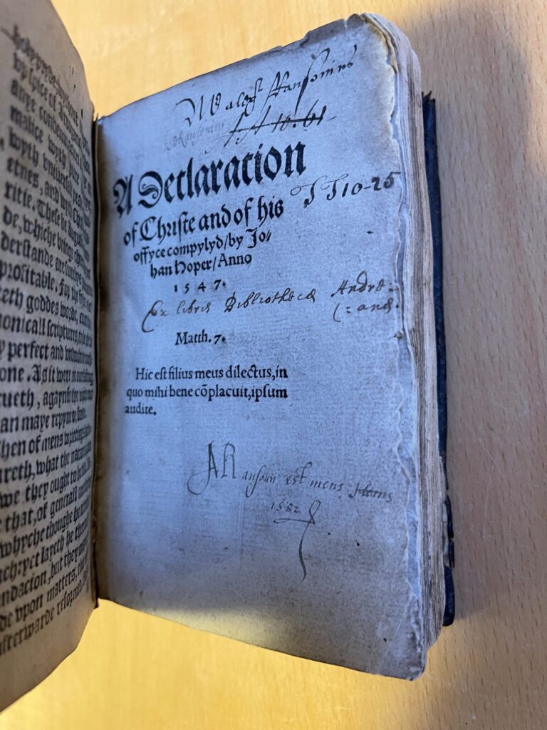 Photograph of title page of printed book, with annotations